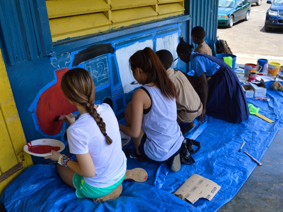 Our volunteers refurbishing a local school