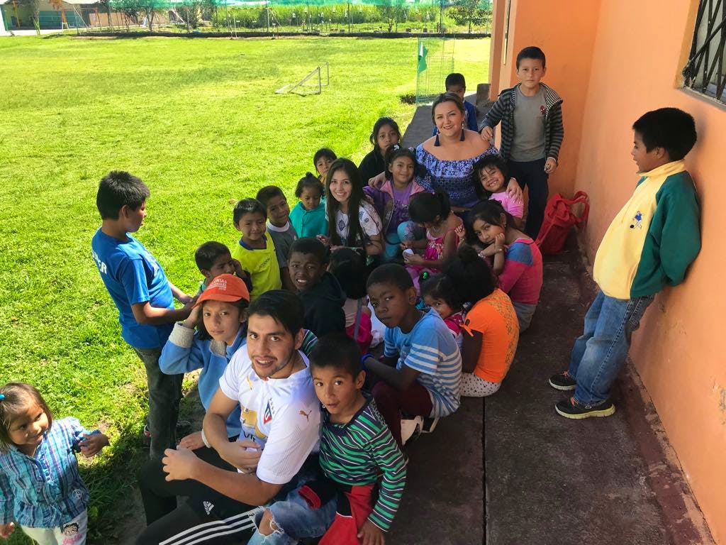 Volunteers supporting a children's home