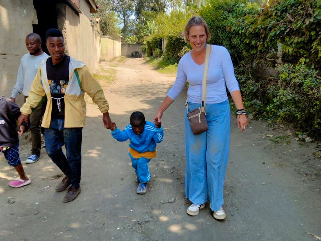 One of our volunteers from a walk with members from the Special needs center