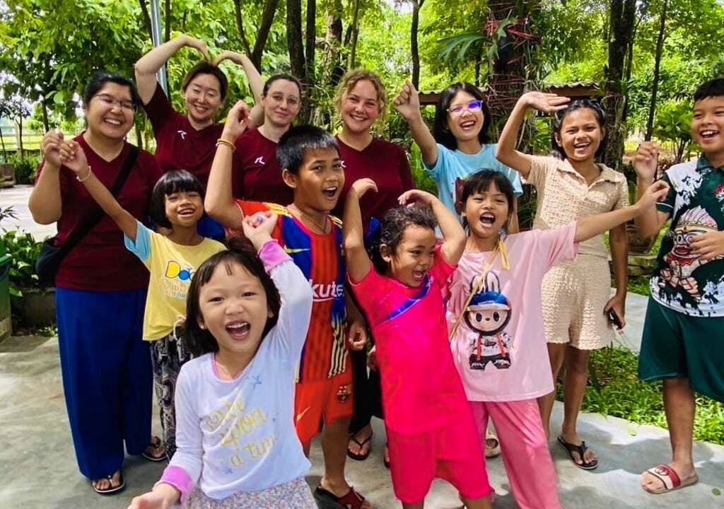 Our volunteers and students striking a pose