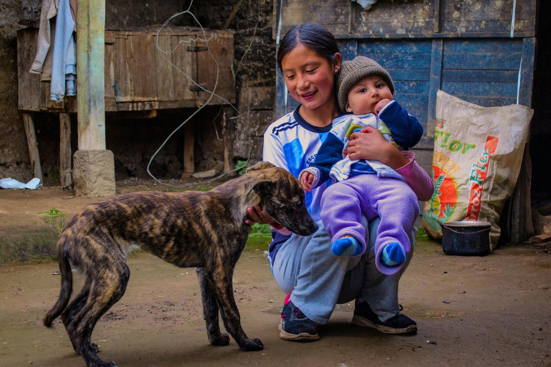 Young girl with baby