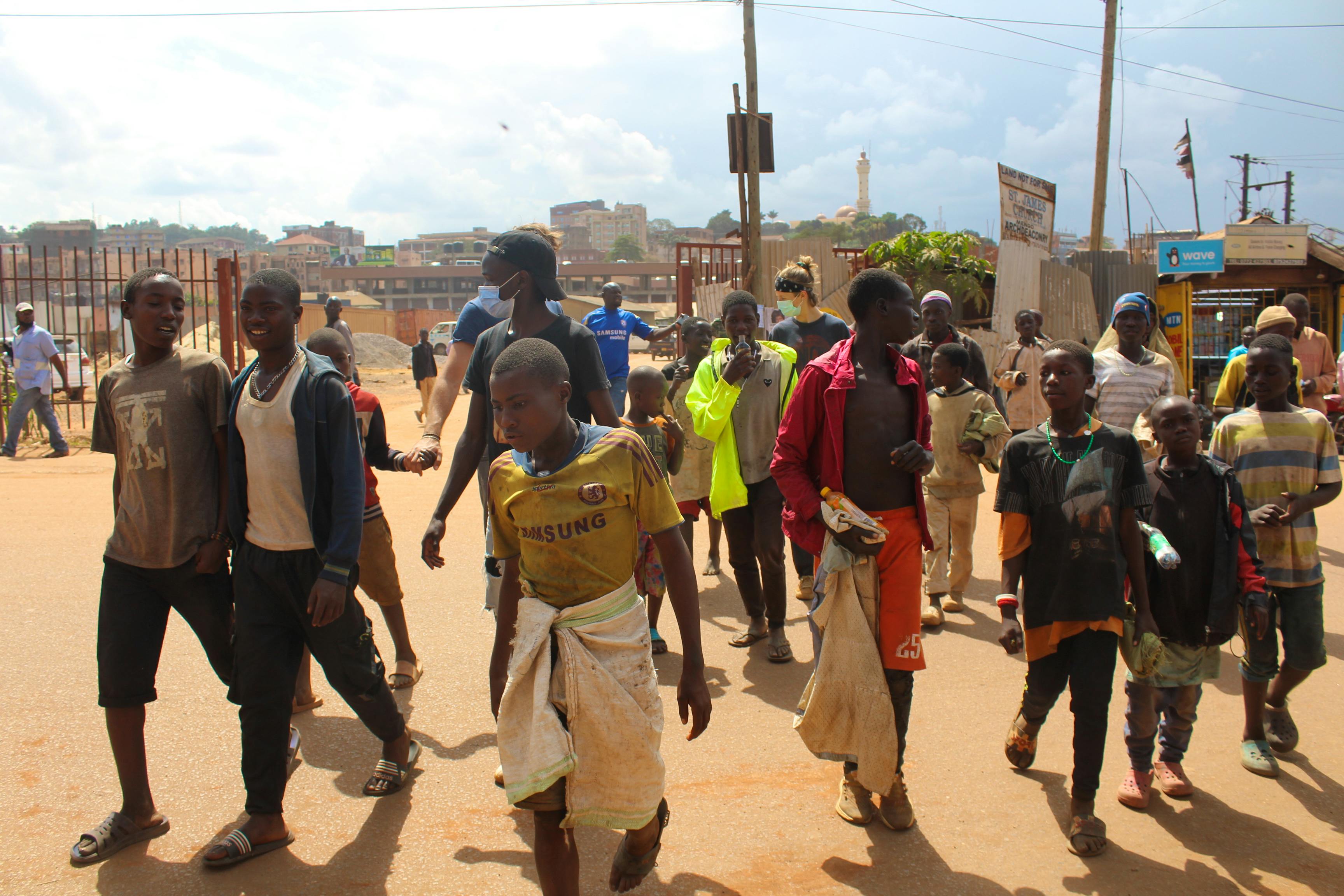 Our vice president Hannah with some of the boys we work with