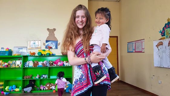 Freiwilligenarbeit mit Kindern Childcare Center Supporter