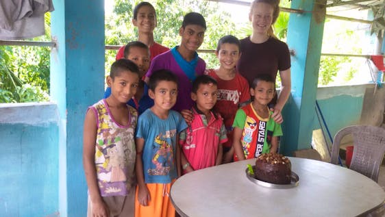Children with British volunteer! One boy has a birthday celebration!