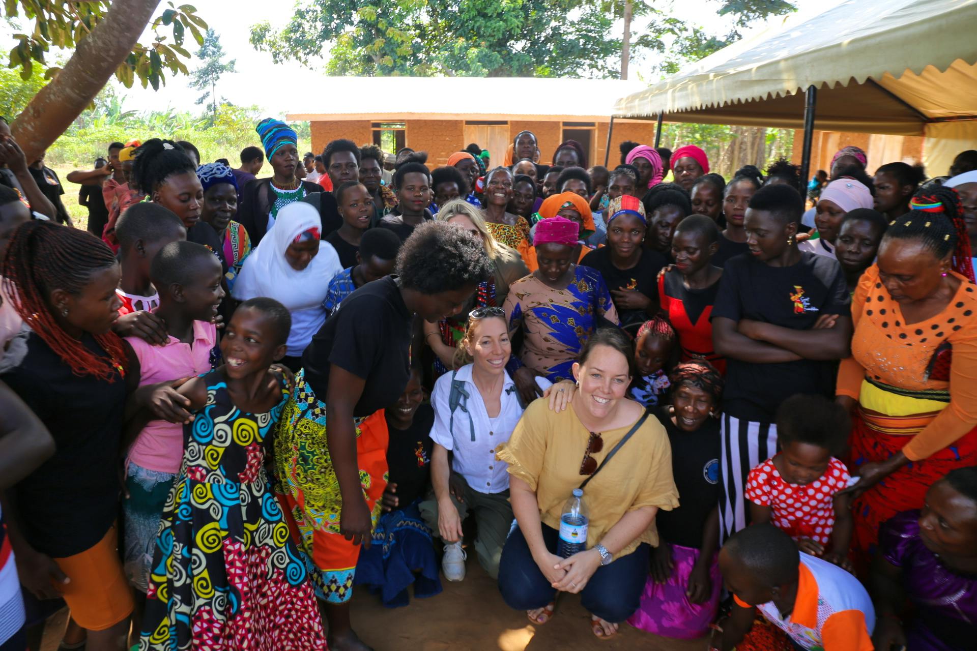 Volunteer in poor family providing support