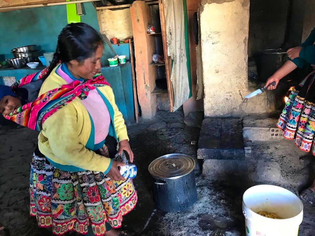 volunteer and woman are working